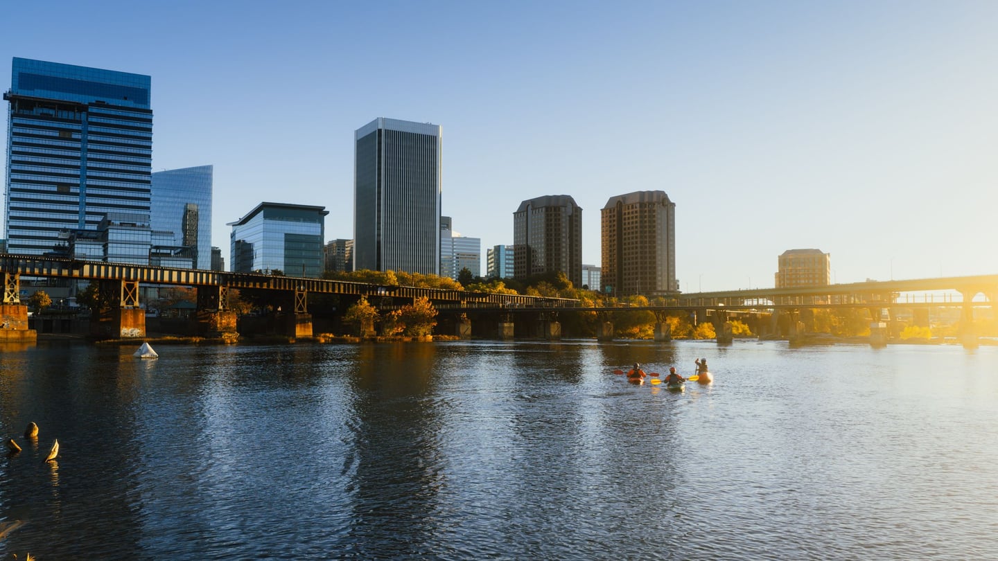 Richmond skyline and the James River in evening light.